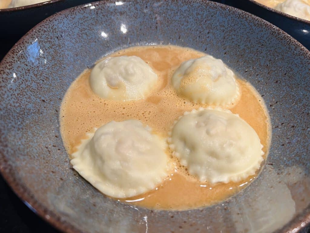 Ravioli with lobster bisque