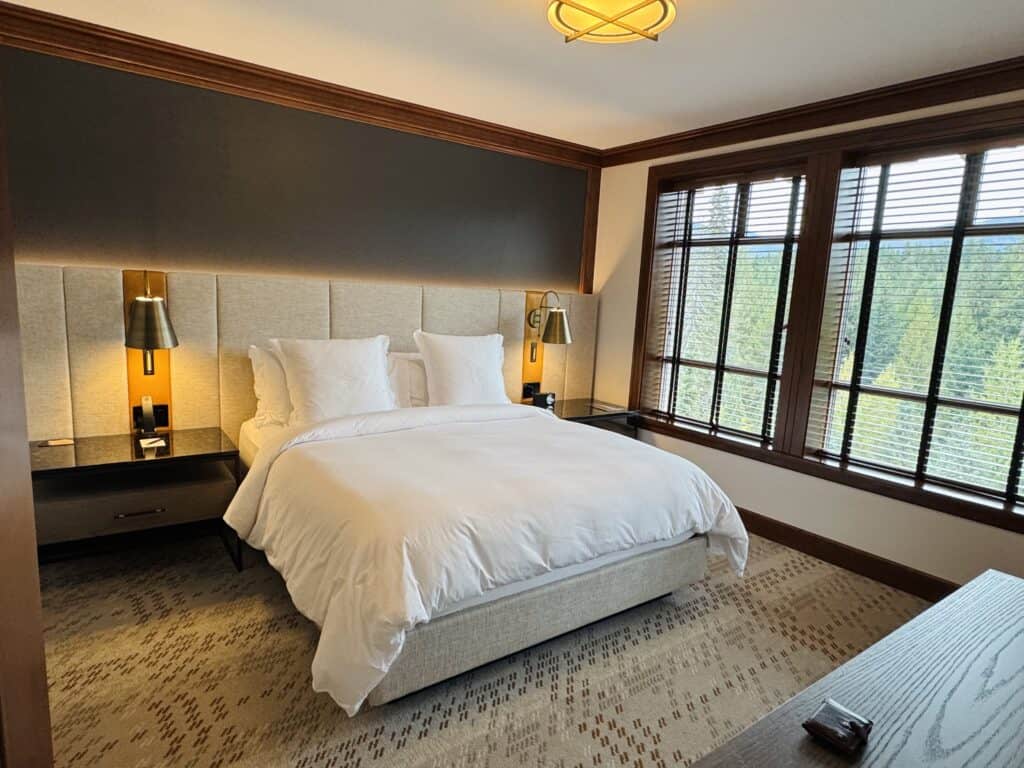 Four Seasons Whistler bedroom with tree-view