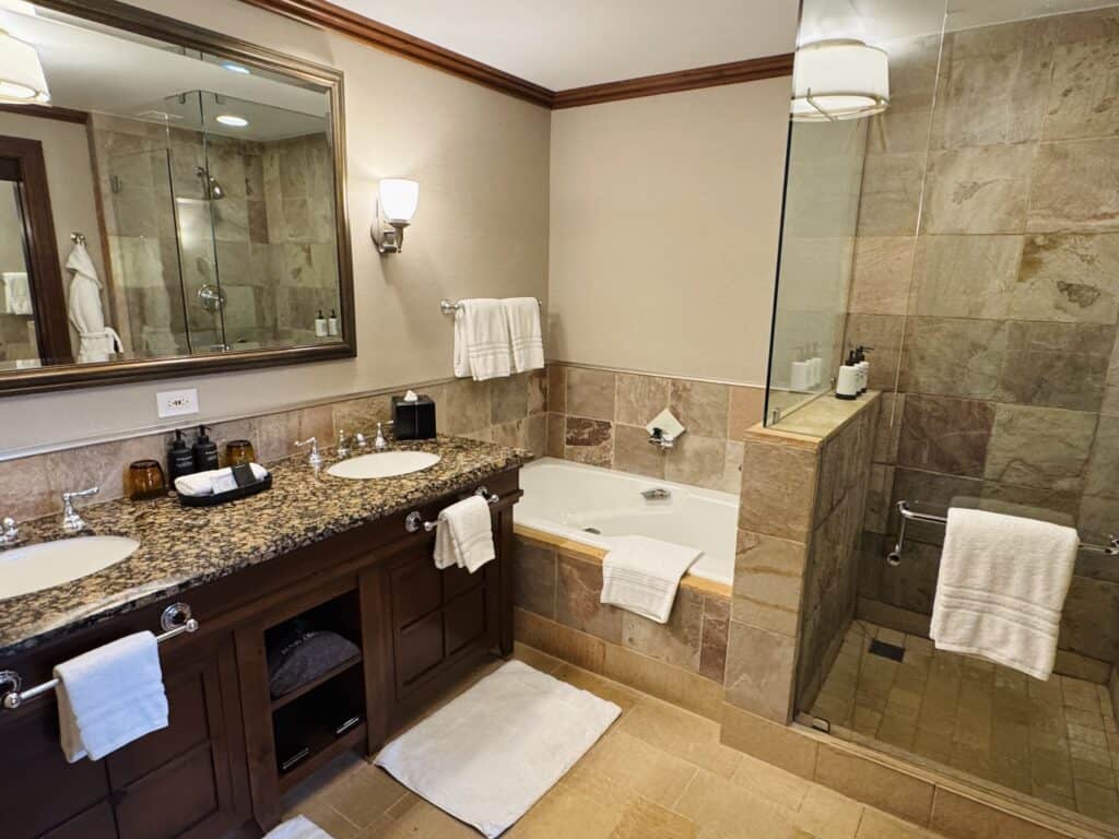 A bathroom with a walk-in shower at Four Seasons Whistler