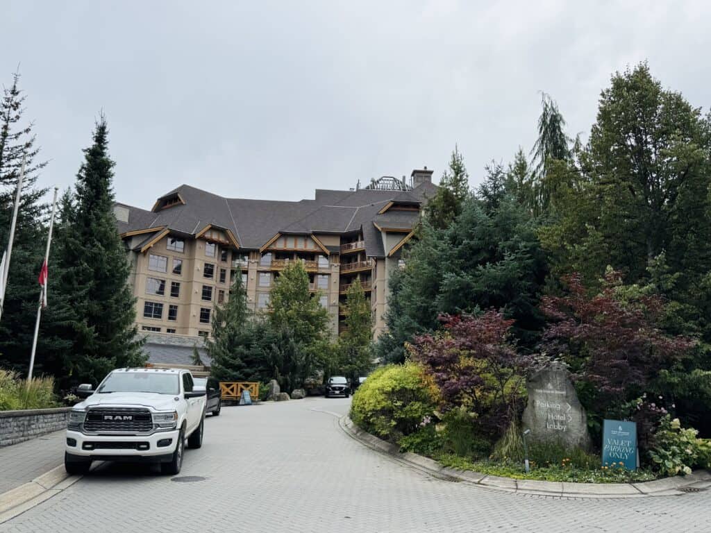 A truck in front of the Four Seasons hotel Whistler