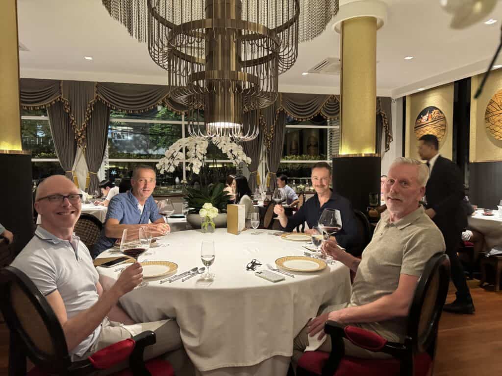 Dinner at R-Haan in Bangkok with four friends at a round table.