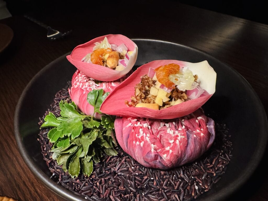 Amuse in lotus buds with Thai flavours at Phulay Bay fine dining.