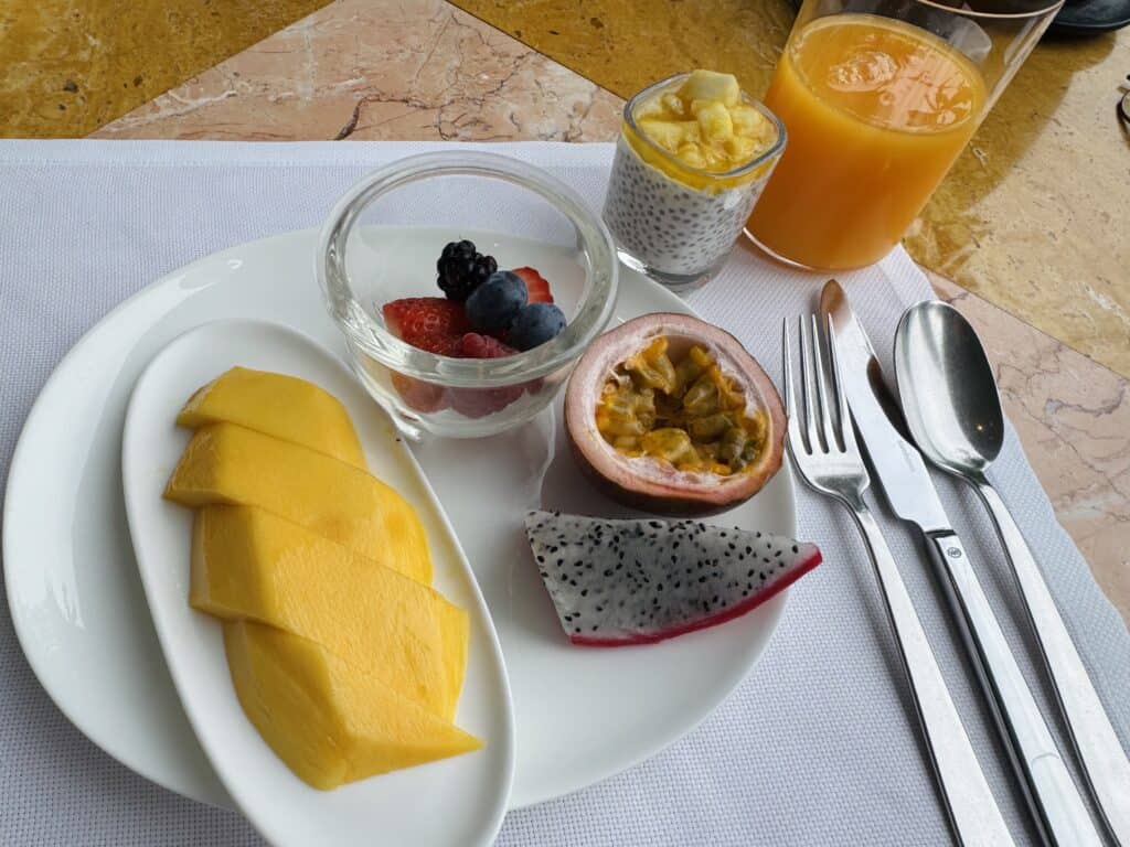 Luxury breakfast with tropical fruit and fresh juices at Four Seasons Bangkok