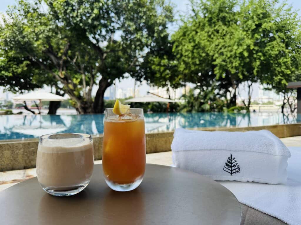 Cocktails and pool at Four Seasons Bangkok on the Chao Phraya River